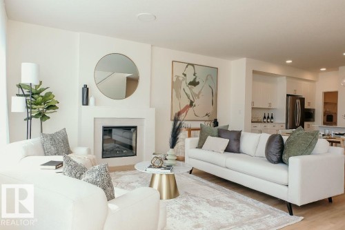 68 Gambel Loop, Spruce Grove, AB - Indoor Photo Showing Living Room With Fireplace