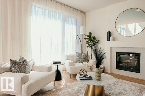 68 Gambel Loop, Spruce Grove, AB - Indoor Photo Showing Living Room With Fireplace