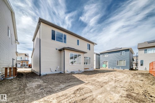 Expansive backyard space with a newly constructed two-story residence - 1603 206 Street, Edmonton, AB - Outdoor With Exterior