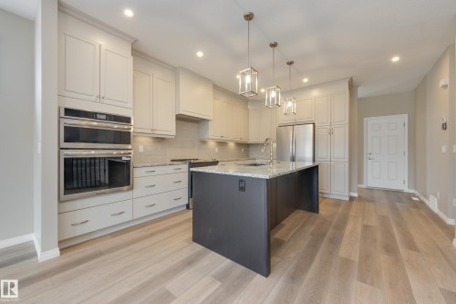 209 Stonehouse Way, Leduc, AB - Indoor Photo Showing Kitchen With Upgraded Kitchen