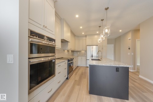 209 Stonehouse Way, Leduc, AB - Indoor Photo Showing Kitchen With Upgraded Kitchen