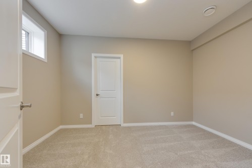 209 Stonehouse Way, Leduc, AB - Indoor Photo Showing Other Room