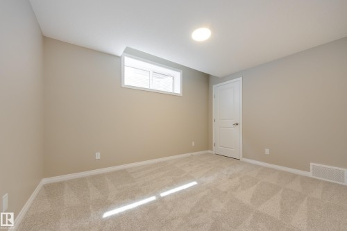 209 Stonehouse Way, Leduc, AB - Indoor Photo Showing Other Room