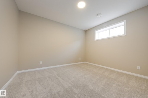 209 Stonehouse Way, Leduc, AB - Indoor Photo Showing Other Room