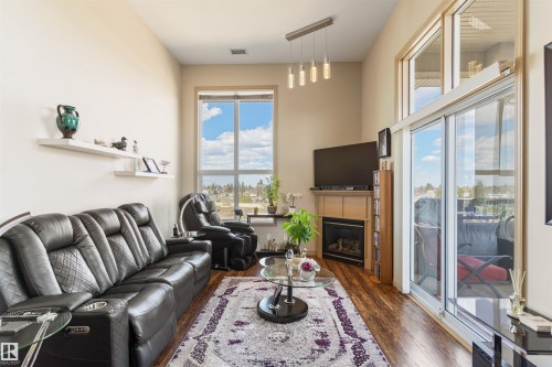 419 7909 71 Street, Edmonton, AB - Indoor Photo Showing Living Room With Fireplace