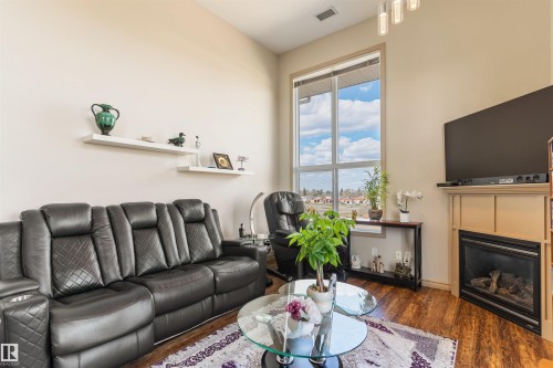 419 7909 71 Street, Edmonton, AB - Indoor Photo Showing Living Room With Fireplace