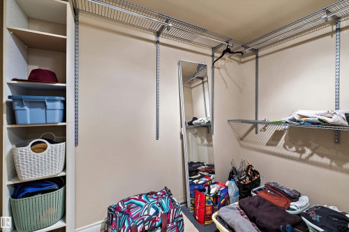 Customizable closet system with built-in shelving, wire shelving, and hanging rods - 11607 141 Street, Edmonton, AB - Indoor Photo Showing Other Room