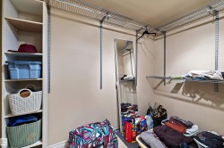 Customizable closet system with built-in shelving, wire shelving, and hanging rods - 