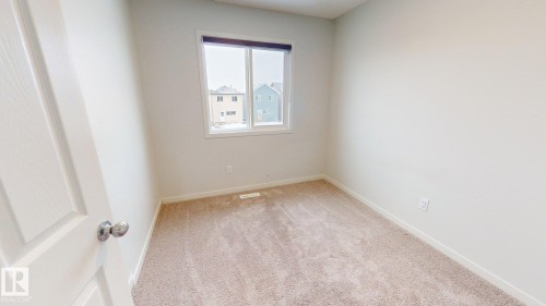 7104 46A Street, Beaumont, AB - Indoor Photo Showing Other Room