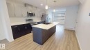 7104 46A Street, Beaumont, AB  - Indoor Photo Showing Kitchen With Double Sink With Upgraded Kitchen 