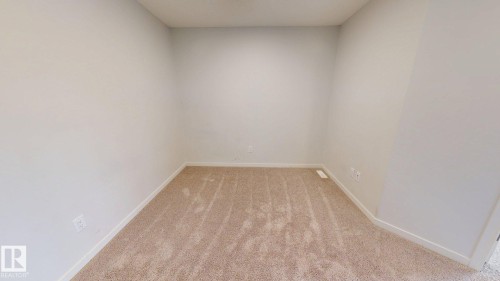 7104 46A Street, Beaumont, AB - Indoor Photo Showing Other Room