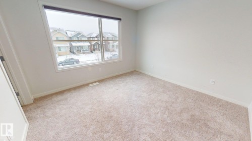 7104 46A Street, Beaumont, AB - Indoor Photo Showing Other Room