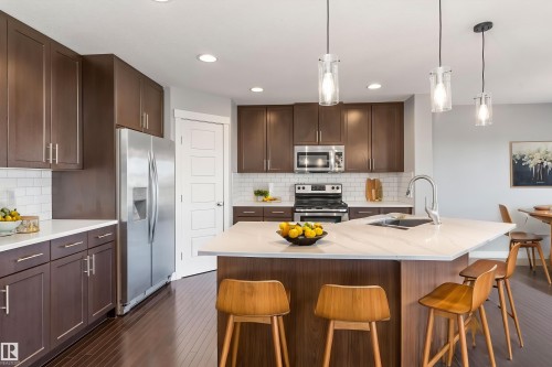 3318 21A Avenue, Edmonton, AB - Indoor Photo Showing Kitchen With Double Sink With Upgraded Kitchen