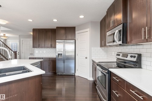 3318 21A Avenue, Edmonton, AB - Indoor Photo Showing Kitchen With Double Sink With Upgraded Kitchen