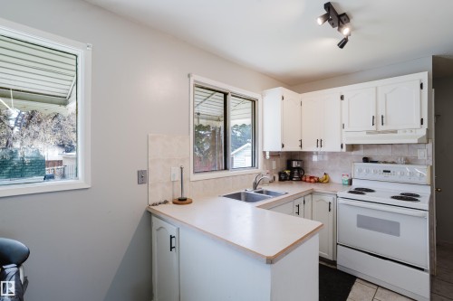 10325 152 Street, Edmonton, AB - Indoor Photo Showing Kitchen With Double Sink