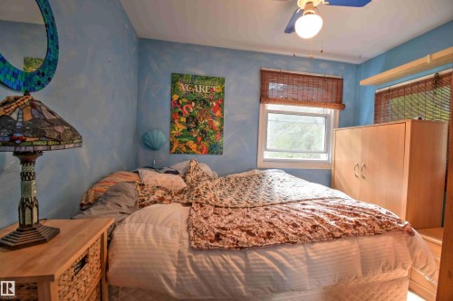 26, 562007 Rr 113, Rural Two Hills County, AB - Indoor Photo Showing Bedroom