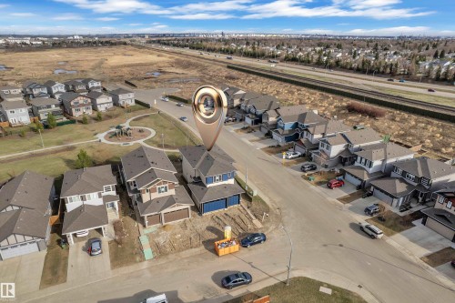 Aerial perspective of a residential community featuring multiple detached properties with attached garages - 12603 44 Street, Edmonton, AB - Outdoor With View