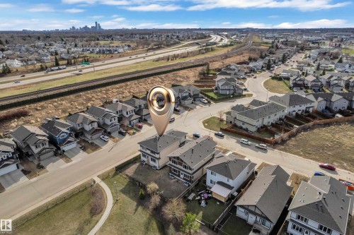Aerial perspective showcasing a residential development with varied property styles - 12603 44 Street, Edmonton, AB - Outdoor With View