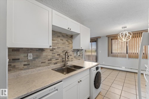 101 51 Brown Street, Stony Plain, AB - Indoor Photo Showing Kitchen With Double Sink