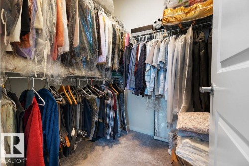 Walk-in closet with wire shelving and hanging rods - 3623 6 Street, Edmonton, AB - Indoor With Storage