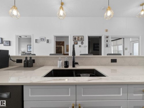 516 9507 101 Avenue, Edmonton, AB - Indoor Photo Showing Kitchen With Double Sink