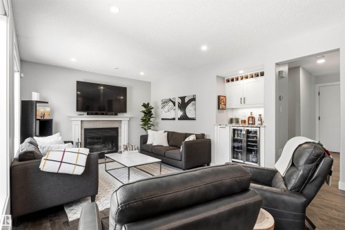 200 Ferguson Place, Edmonton, AB - Indoor Photo Showing Living Room With Fireplace