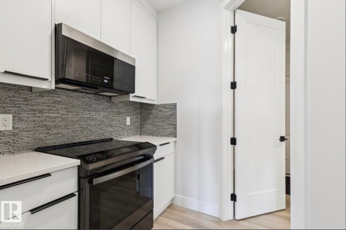 Stove and Microwave Hood Fan in Pantry. - 9751 223 Street, Edmonton, AB - Indoor Photo Showing Kitchen