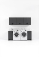 Dedicated laundry area featuring a white marble-patterned countertop, under-mount sink with a chrome faucet, and dark grey cabinetry - 