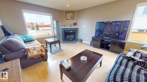 548 Wiseman Lane, Edmonton, AB - Indoor Photo Showing Living Room With Fireplace