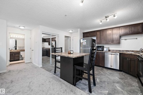 1128 330 Clareview Station Drive, Edmonton, AB - Indoor Photo Showing Kitchen With Stainless Steel Kitchen With Double Sink