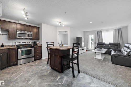 1128 330 Clareview Station Drive, Edmonton, AB - Indoor Photo Showing Kitchen With Stainless Steel Kitchen