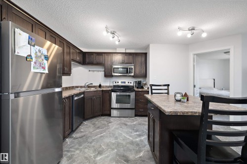 1128 330 Clareview Station Drive, Edmonton, AB - Indoor Photo Showing Kitchen With Stainless Steel Kitchen