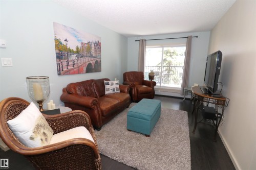 202 340 Windermere Road, Edmonton, AB - Indoor Photo Showing Living Room