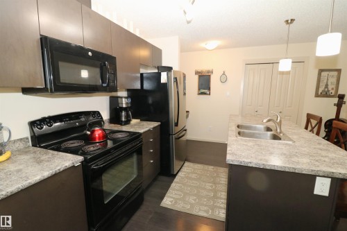 202 340 Windermere Road, Edmonton, AB - Indoor Photo Showing Kitchen With Double Sink