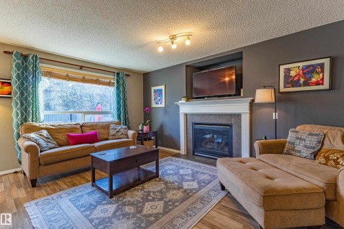 1438 Potter Greens Drive, Edmonton, AB - Indoor Photo Showing Living Room With Fireplace