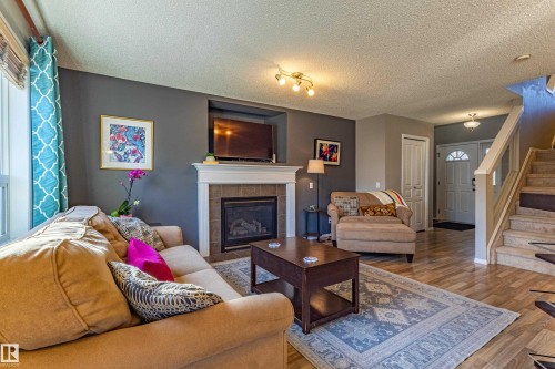 1438 Potter Greens Drive, Edmonton, AB - Indoor Photo Showing Living Room With Fireplace