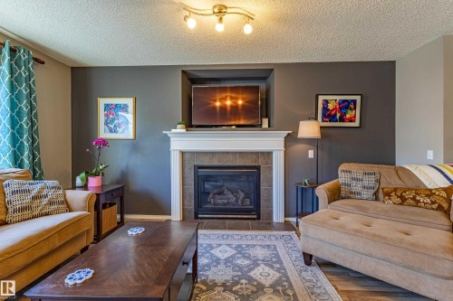 1438 Potter Greens Drive, Edmonton, AB - Indoor Photo Showing Living Room With Fireplace