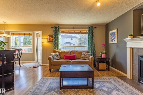 1438 Potter Greens Drive, Edmonton, AB - Indoor Photo Showing Living Room With Fireplace