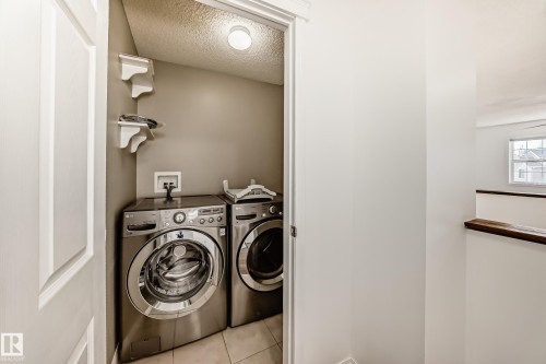 54 Royal Elm Road Nw, Calgary, AB - Indoor Photo Showing Laundry Room