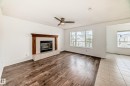 54 Royal Elm Road Nw, Calgary, AB  - Indoor Photo Showing Living Room With Fireplace 