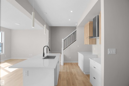 7103 50A Avenue, Beaumont, AB - Indoor Photo Showing Kitchen With Upgraded Kitchen