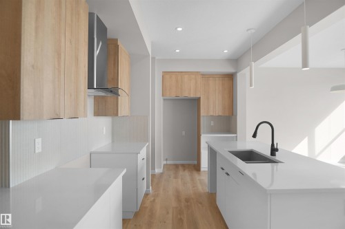 7103 50A Avenue, Beaumont, AB - Indoor Photo Showing Kitchen With Double Sink With Upgraded Kitchen