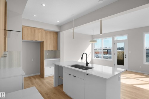 7103 50A Avenue, Beaumont, AB - Indoor Photo Showing Kitchen With Double Sink With Upgraded Kitchen