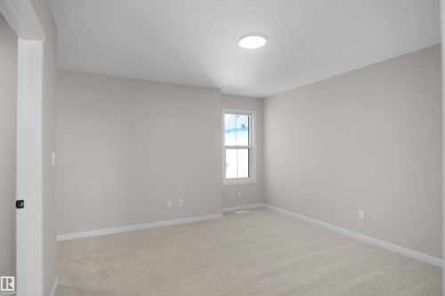 7103 50A Avenue, Beaumont, AB - Indoor Photo Showing Other Room