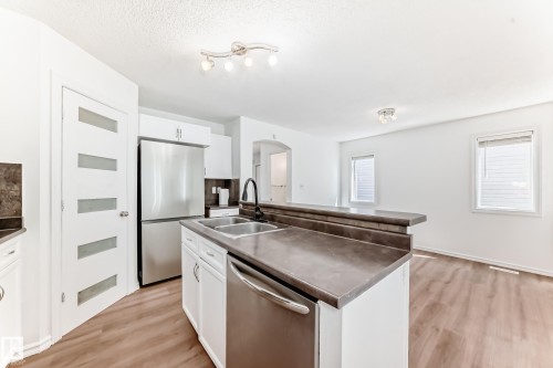 115 Keystone Lane, Leduc, AB - Indoor Photo Showing Kitchen With Stainless Steel Kitchen With Double Sink
