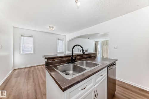 115 Keystone Lane, Leduc, AB - Indoor Photo Showing Kitchen With Double Sink