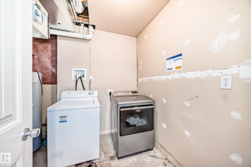 115 Keystone Lane, Leduc, AB - Indoor Photo Showing Laundry Room