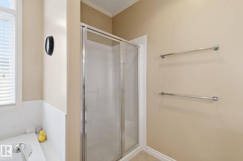 Shower enclosure with clear glass doors and chrome hardware - 30 Valleyview Ridge, Fort Saskatchewan, AB - Indoor Photo Showing Bathroom
