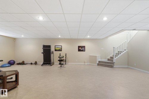 Spacious lower level featuring light beige carpeting, recessed lighting, and a neutral wall color - 30 Valleyview Ridge, Fort Saskatchewan, AB - Indoor