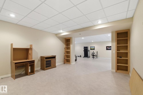 Expansive finished lower level featuring recessed lighting and neutral carpeting - 30 Valleyview Ridge, Fort Saskatchewan, AB - Indoor